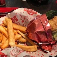 Photo taken at Red Robin Gourmet Burgers and Brews by Jason C. on 7/4/2019