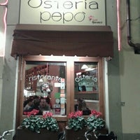 Photo taken at Osteria Pepò by Angela B. on 1/1/2013