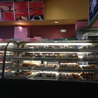 Photo taken at Doughboys Donuts by Lori H. on 12/31/2012