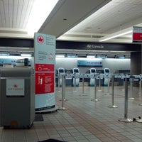 Photo taken at Air Canada Check-in by Cecil T. on 10/11/2012