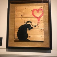 Photo taken at Banksy expo by Clara on 6/19/2018