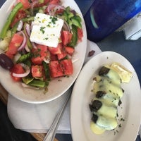 Photo taken at Santorini Greek Cuisine by Kelsey H. on 7/13/2018