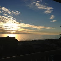 Photo taken at Seacliff Beach Hotel by Alicia L. on 8/25/2013