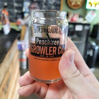 Photo taken at Peachtree Growler Company by Steven R. on 9/8/2022