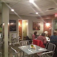 Photo taken at The Pizza Grille by Rebecca E. on 1/5/2013