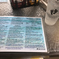 Photo taken at Barefoots Beachside Bar &amp;amp; Grill by Jane L. on 4/9/2018