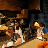 Photo taken at Crust Wood Fired Pizza by Andrew S. on 12/26/2019