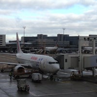 Photo taken at Gate D63 by Sergey D. on 12/10/2012