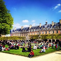 Photo taken at Place des Vosges by Seyed M. on 4/21/2013