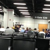 Photo taken at Gate E29 by Amos B. on 5/3/2013