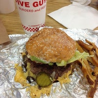 Photo taken at Five Guys Burgers &amp;amp; Fries by Carlos S. on 5/25/2013