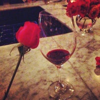 Photo taken at Wine &amp;amp; Roses Wine Bar &amp;amp; Cafe by Sarah B. on 3/23/2013
