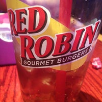 Photo taken at Red Robin Gourmet Burgers and Brews by Elyse H. on 3/23/2013