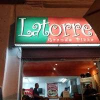 Photo taken at Latorre Pizza Santiago Centro by Ignacio C. on 3/17/2013