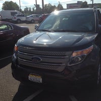 Photo taken at Malouf Ford - Lincoln, Inc. by Andrew H. on 8/11/2014