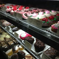Photo taken at Crumbs Bake Shop by John G. on 2/11/2013