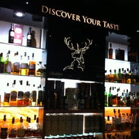 Photo taken at World of Whiskies by Ldn S. on 6/9/2013