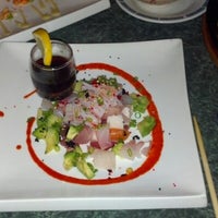 Photo taken at Osaka Japanese Restaurant by Jennie N. on 12/24/2012