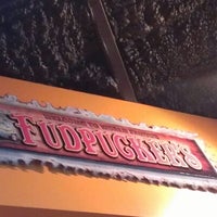 Photo taken at Fudpuckers on the Island by Jeff B. on 7/4/2013