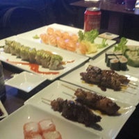 Photo taken at Planet Sushi by Fatos Y. on 1/23/2014
