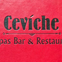 Photo taken at Ceviche Tapas Bar and Restaurant by Rafael E. on 9/14/2018