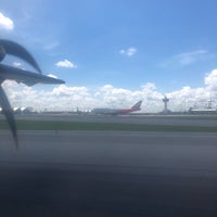 Photo taken at Taxiway E by Porapat B. on 6/30/2018