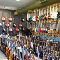 Photo taken at Rock N Roll Vintage Chicago Guitar Shop by Brett W. on 8/28/2014