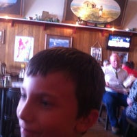 Photo taken at Western Kansas Saloon &amp; Grill by Gary T. on 6/24/2012