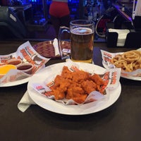 Photo taken at Hooters by Kenny C. on 12/20/2015