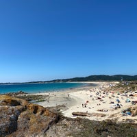 Photo taken at Praia da Lanzada by Burcu💫 on 8/17/2021