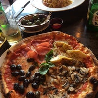 Photo taken at Tomo Pizzeria &amp;amp; Restaurant by Osik P. on 7/13/2014