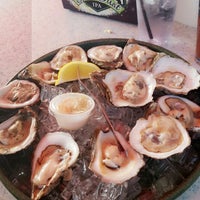 Photo taken at Bimini&amp;#39;s Oyster Bar &amp;amp; Seafood Cafe by Mike on 5/1/2018