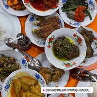 Photo taken at Rumah Makan Surya - Masakan Padang by Haiqal R. on 7/21/2023