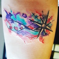 Photo taken at Under the Needle Tattoos by Kayla M. on 8/12/2016