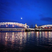 Photo taken at Bolsheokhtinsky Bridge (Peter the Great Bridge) by Konstantin K. on 6/19/2013