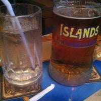 Photo taken at Islands Restaurant Long Beach Towne Center by Sheila W. on 2/12/2013
