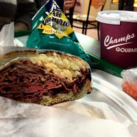 Photo taken at Champs Gourmet Deli by Chris J. on 9/24/2012