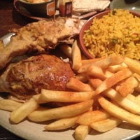 Photo taken at Nando&amp;#39;s by Lucky T. on 4/28/2013