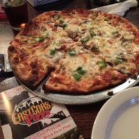 Photo taken at East Coast Pizza by Georgina M. on 1/27/2015