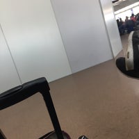 Photo taken at Gate 233 by Esther A. on 5/11/2018