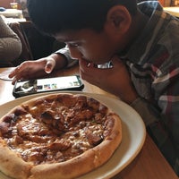 Photo taken at California Pizza Kitchen by Naveen P. on 12/31/2017