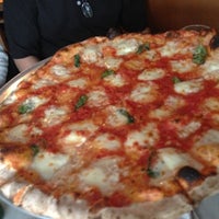 Photo taken at Pizza Mezzaluna by Lockhart S. on 12/9/2012