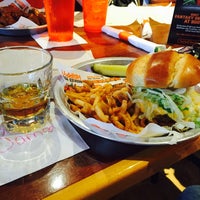 Photo taken at Hooters by Edgar P. on 7/25/2015