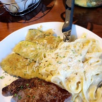 Photo taken at Olive Garden by Alex L. on 5/12/2019