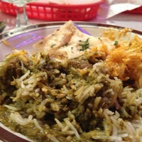Photo taken at Madhu Cuisine of India by Linda K. on 2/15/2013