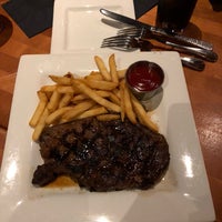 Photo taken at FlameStone American Grill by blacklabs b. on 4/18/2018
