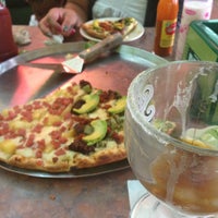 Photo taken at Pizzas &amp;amp; Chelas - El Tanque by Oskar A. on 4/13/2013