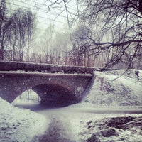Photo taken at Ж/д мост в Удельном парке by Екатерина Щ. on 3/26/2013