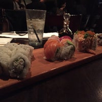 Photo taken at Okura Robata Sushi Bar and Grill by Cj T. on 10/5/2015