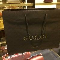 Photo taken at Gucci by Pond B. on 8/19/2014